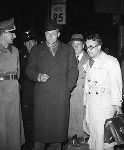 The Nazi book censor, Lieut. Gerhard Heller, with pro-German writers, Pierre Drieu La Rochelle (center) and Robert Brasillach